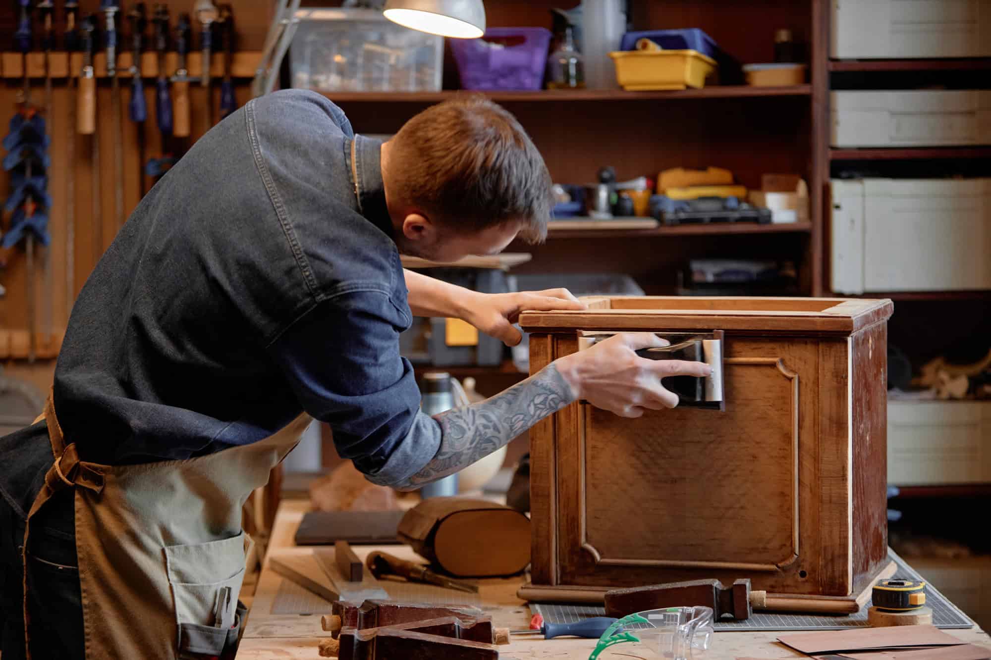 crafting antique furniture in woodworking workshop jpg